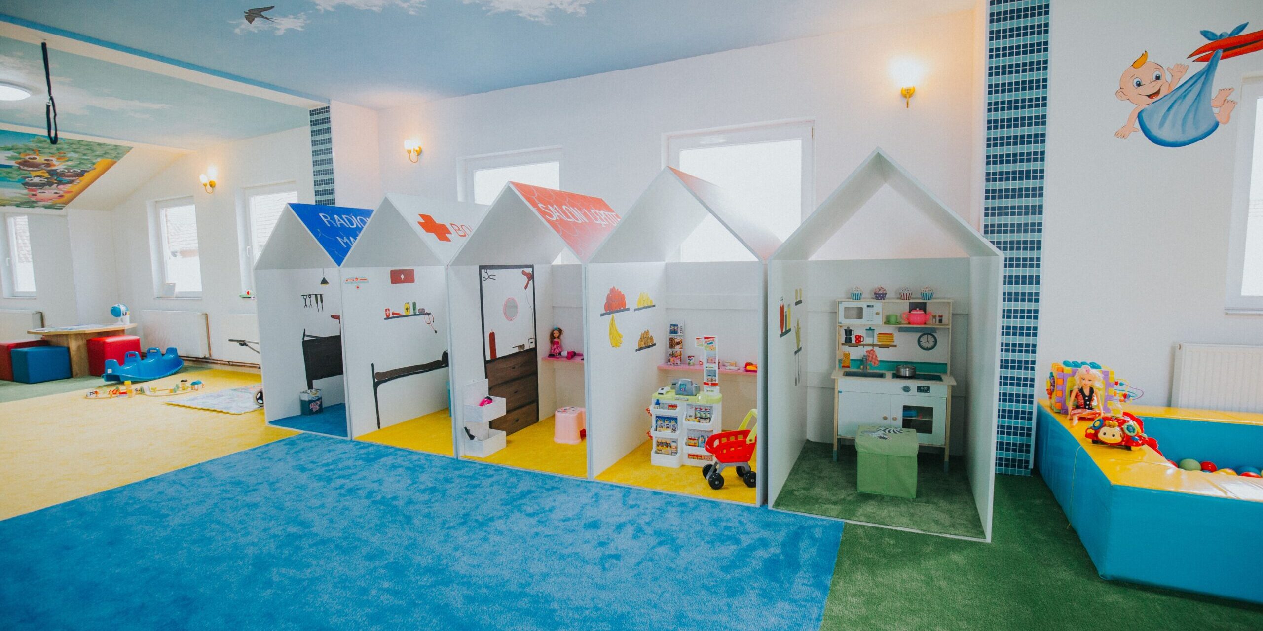 A wide shot of boys and girls playground area at a daycare center